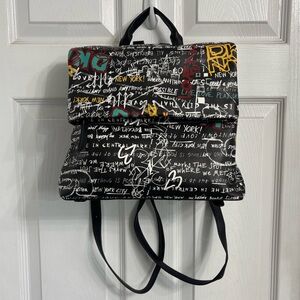 DKNY Tilly Graffiti Fold Over Back Pack Vegan Leather Monogram Interior